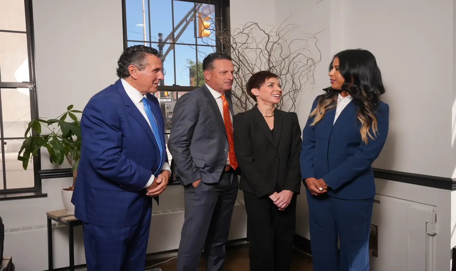 Faugno Weis Duarte Raso, LLC attorneys in a meeting reviewing case documents